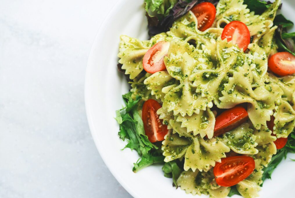 Pesto pasta with cherry tomatoes and basil for Genovese pesto wholesale article