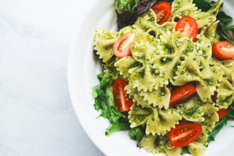 Pesto pasta with cherry tomatoes and basil for Genovese pesto wholesale article