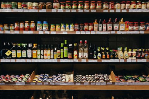 Italian-style retail shelf with oils sauces and condiments for premium Italian food retail